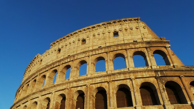 An exterior photo of the Colosseum.