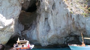 A cave along our path. You can see a little of how blue the water was.